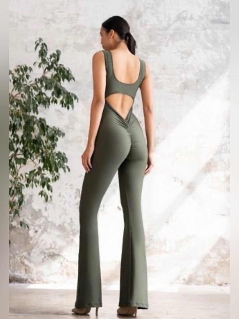 Heart and hips Scrunch Butt olive green flare leg open back Jumpsuit size M